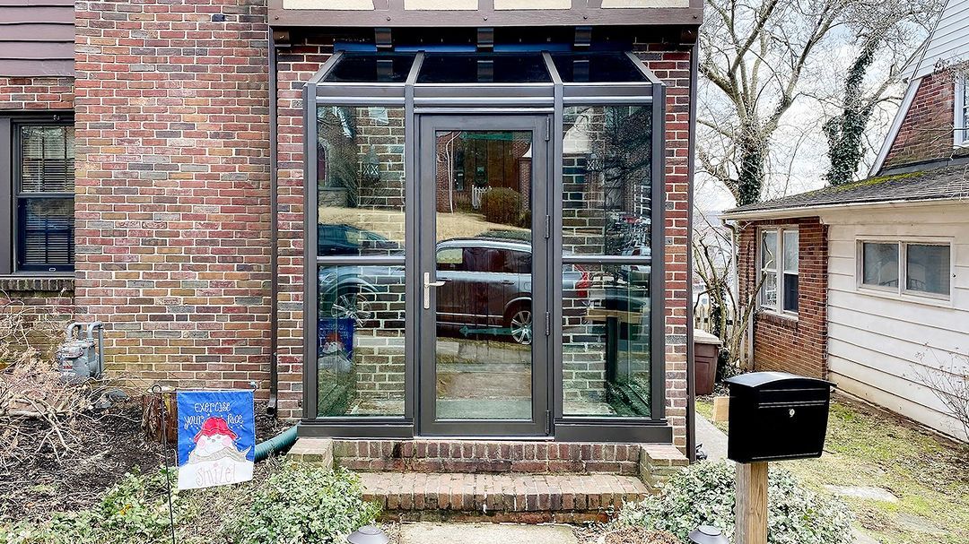 Modern Commercial Door Installation featuring a durable glass entry door with an aluminum frame for a secure, stylish, and welcoming business entrance.