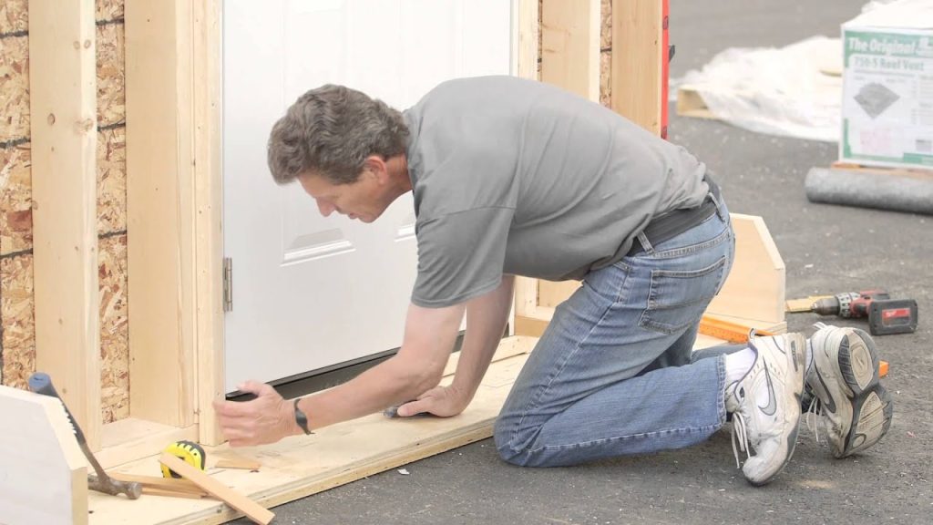 Best Door Installation for Secure Exterior Entry Best Door Installation by an experienced worker ensuring a secure exterior door fit for enhanced safety, durability, and curb appeal.